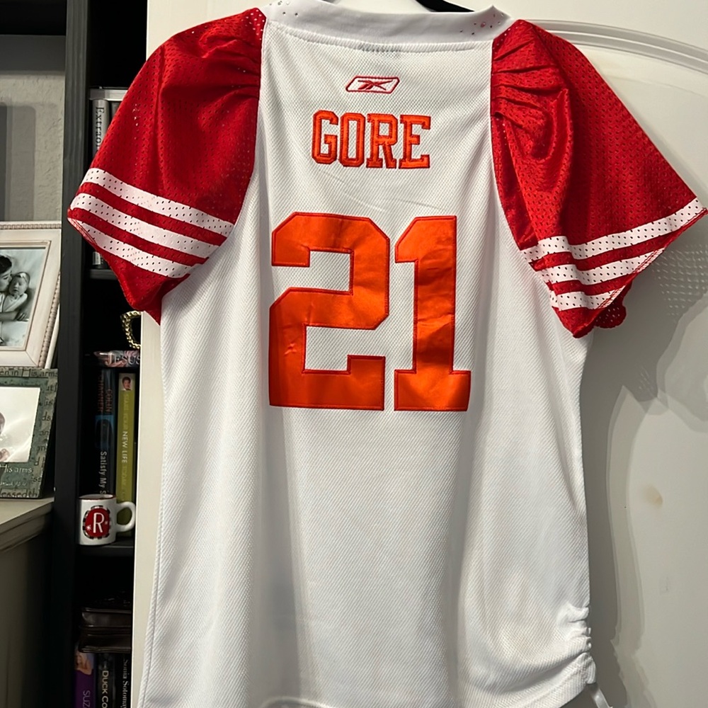 49ers Gore 21 , blinged jersey .